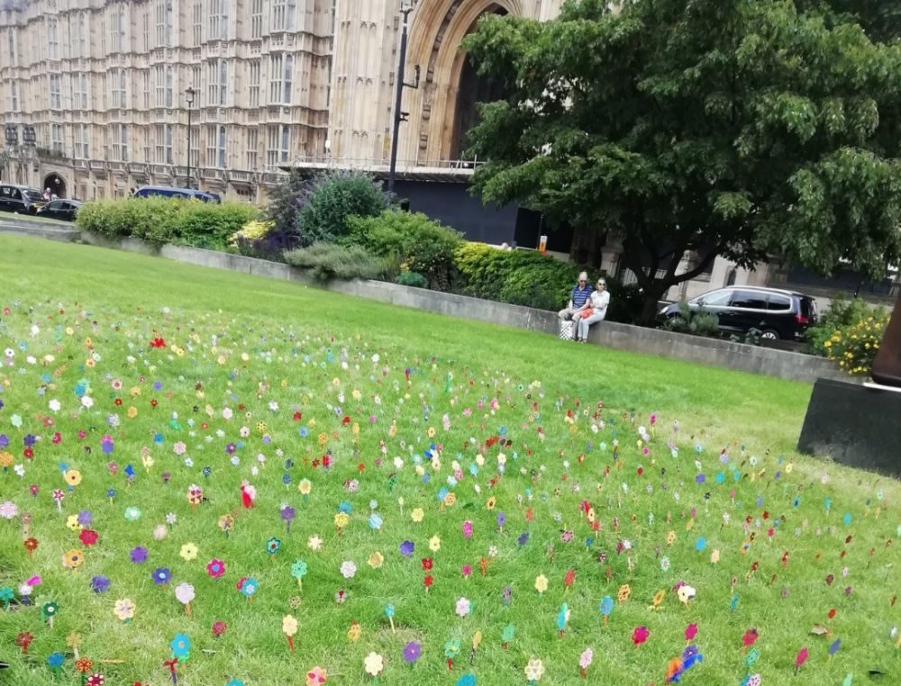 Flowers planted in the green outside Parliament